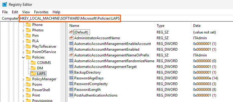 Windows Registry Editor showing HKEY_LOCAL_MACHINE SOFTWARE Microsoft Policies LAPS with AdministratorAccountName ITAdmin and AutomaticAccountManagement registry keys